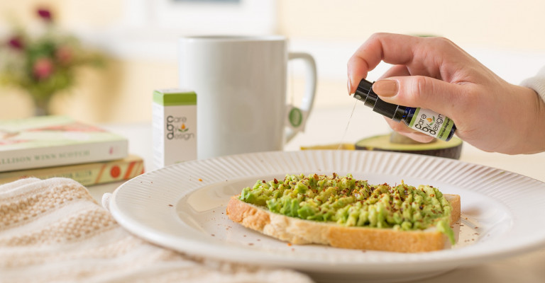 Avocado toast on a plate with Care By Design tincture