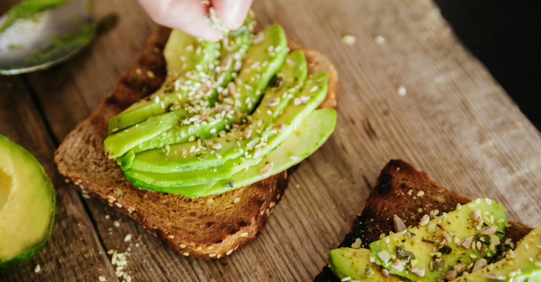 Photo showing two slices of avocado toast