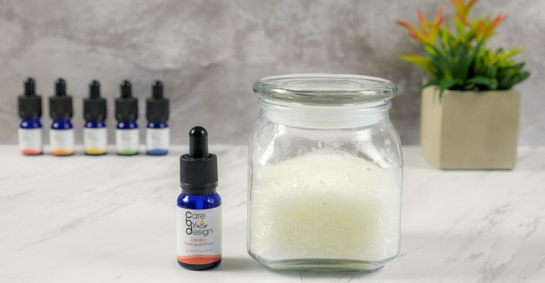 Care By Design tincture with white bath salts