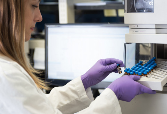 A woman testing cannabis extractions